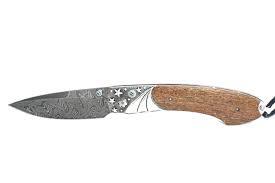 B12 IWO JIMA  STERLING SILVER FOLDING KNIFE WITH USS CALIFORNIA WOOD
The Spearpoint ‘Woodland’ features a light and resilient frame in aerospace